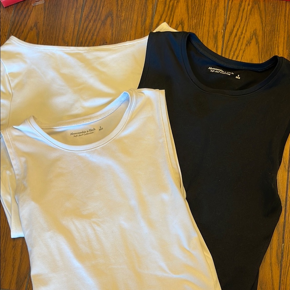 Abercrombie  & Fitch basic bodysuits (3): 2 White and 1 navy bodysuits. Size: S